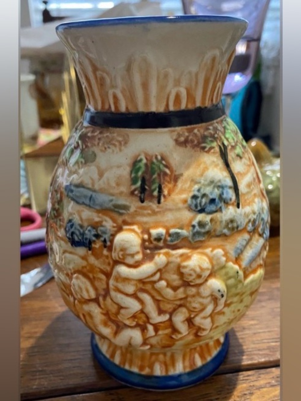 1935 Japan Majolica Porcelain Vase featuring a raised Cherubs front and back. EC